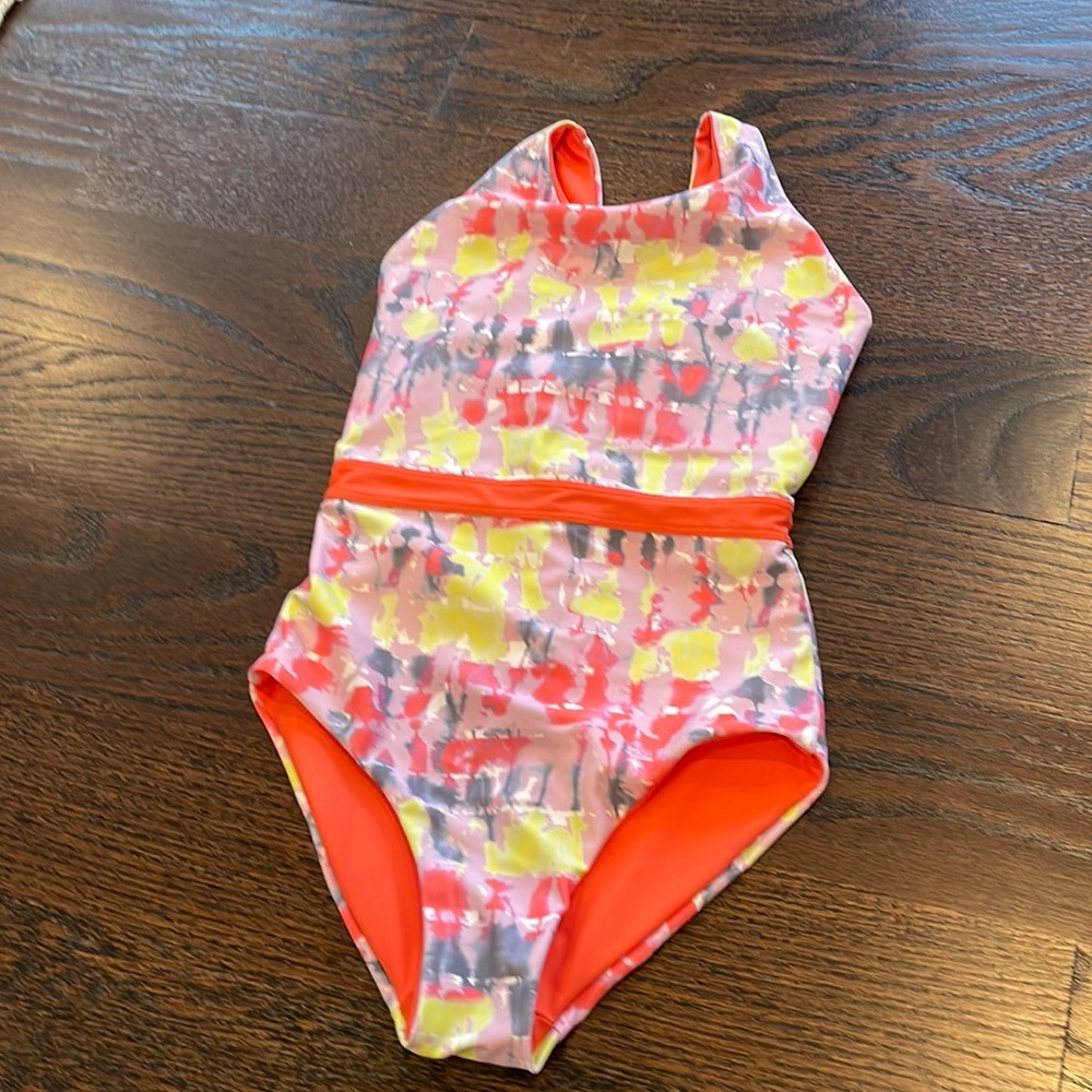 Nordstrom girls bathing suit. Never worn. No tags. Reversible. Size 10
